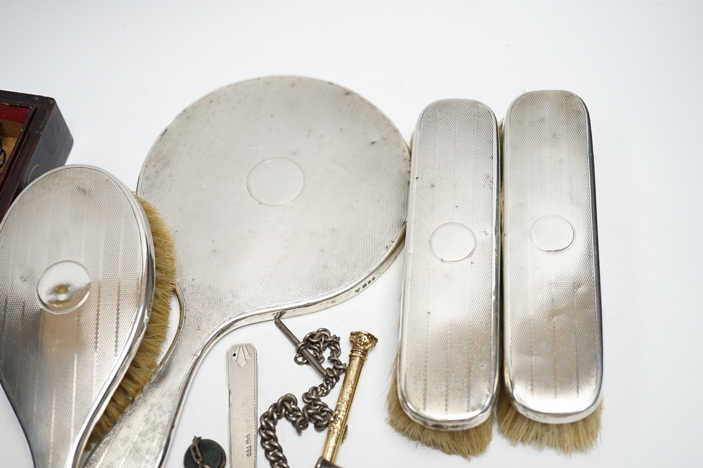 Sundry silver and other items including a four piece mirror and brush set, propelling pencils, silver albert and hatpins including three silver by Charles Horner.